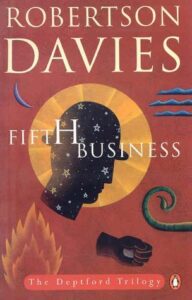 Book cover for Fifth Business by Robertson Davies. Image on cover shows the silhouette of a man’s head against a round yellow object, possibly the sun. Near him are various objects like a black fist, the tendril of a growing plant, and three solid blue lines in a row. 
