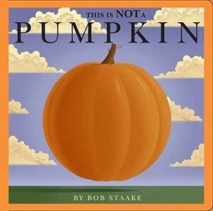Book cover for This Is NOT a Pumpkin by Bob Staake. Image on cover shows a perfectly round pumpkin floating in the air above a flat, green field. The sky behind it is partly cloudy. 
